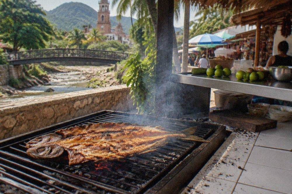 Whole grilled fish with charred skin resting on a charcoal grill beside limes