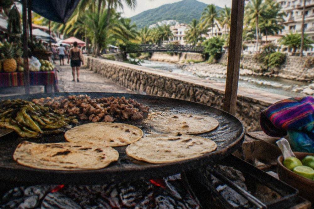 A street vendor grilling tacos on a charcoal comal at a neighborhood stand